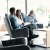 a group of people sitting in chairs