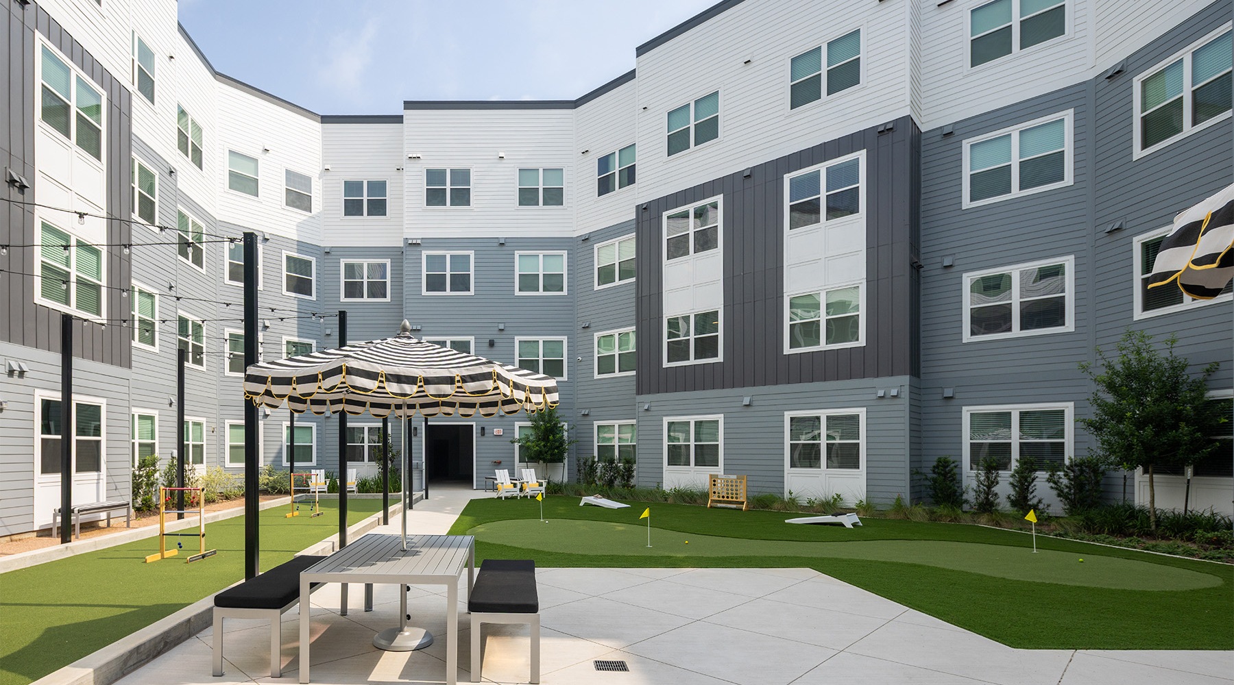 courtyard with shaded table seating