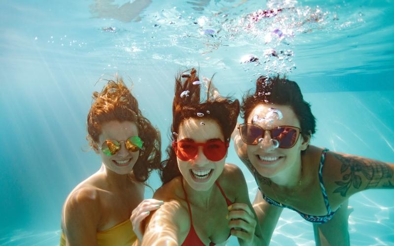 a group of people in a pool